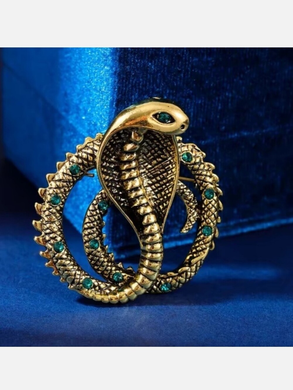Gold Cobra Statement Brooch with Green Accents